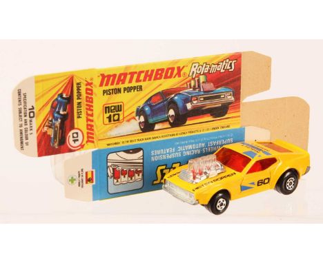 Matchbox Superfast 10b Piston Popper US Issue - yellow body with black &amp; blue racing number 60 tampo print, dark amber wi