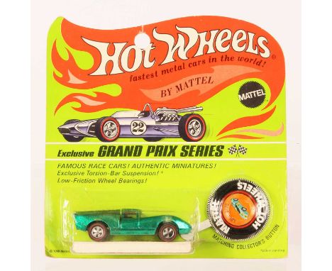 Hot Wheels Redline Lola GT70 Spectraflame Green, black interior, clear screen, 1968 USA base, some toning &amp; pitting to bo