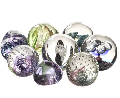 A collection of Caithness paperweights, comprising four small and four large paperweights (8)