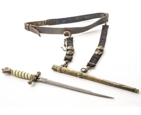 A WWII Kriegsmarine second pattern dagger, by Weyersberg, Kirschbaum & Co and with double-etched blade held in a wooden core 