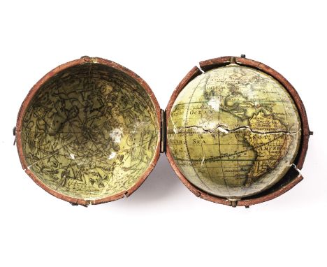 A George IV three inch pocket globe by Lane, the continents outlined in red and green, labelled Lane’s Improved Globe, London