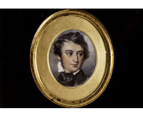 An 18th century English school oval portrait miniature on ivory of the bust of a young man facing sinister against a cloud an