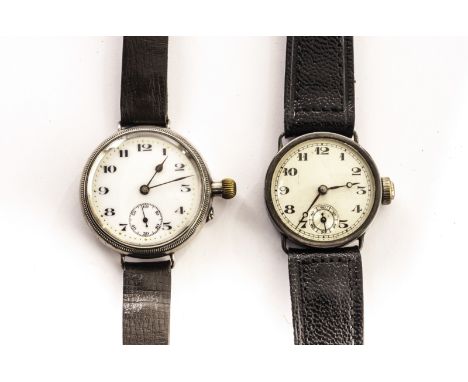 Two Art Deco silver gentleman’s wristwatches, both with circular cases, one with enamel dial, both on leather straps (2)