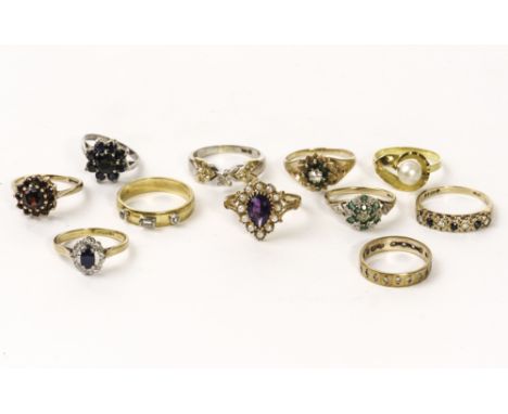 A good collection of eleven gem set and other rings, including a pretty 9ct gold, amethyst and seed pearl example, a garnet c