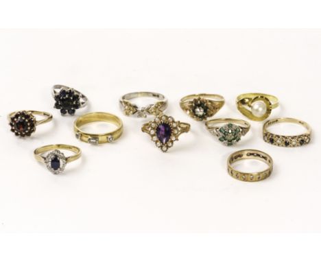 A good collection of eleven gem set and other rings, including a pretty 9ct gold, amethyst and seed pearl example, a garnet c