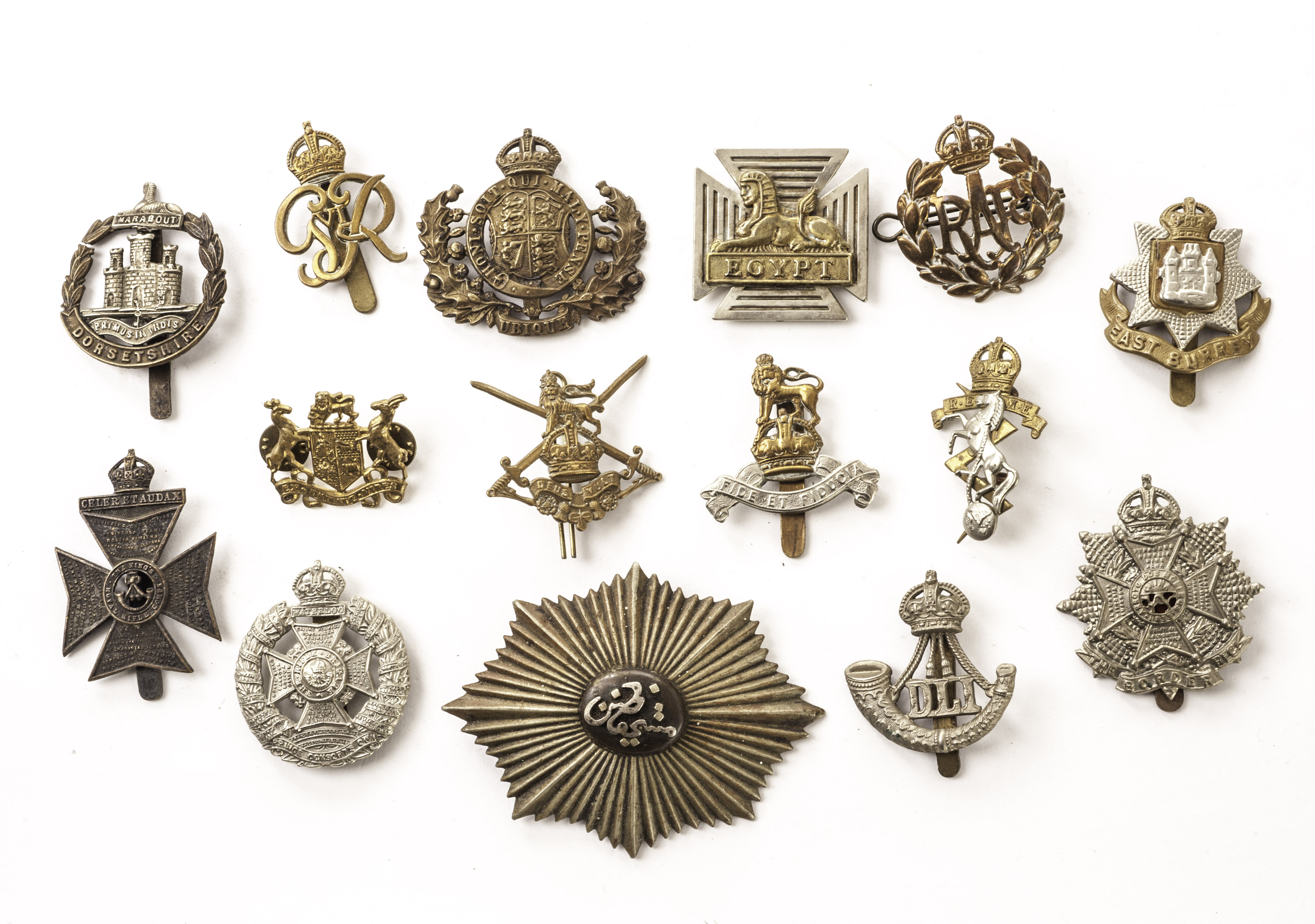 A substantial collection of British and allied military cap badges ...