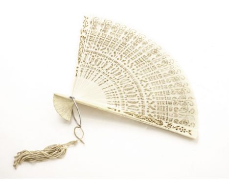 A 19th century Chinese ivory fan, having pierced designs to tapered stems