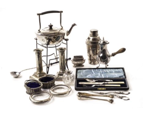 A collection of silver plated items, including a fine Christofle toddy ladle and pair of tongs, a teapot on stand, a café au 
