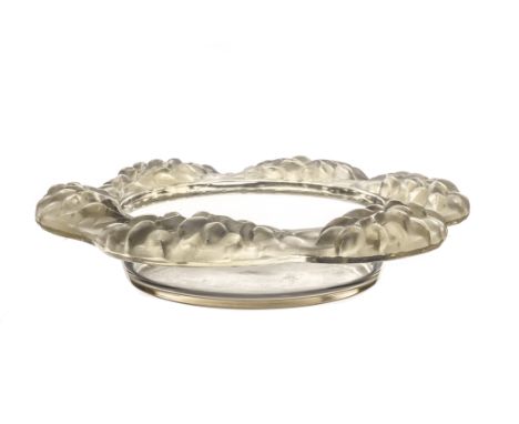 An R. Lalique glass dish, having raised frosted leaf design to shaped rim with circular clear well, etched to base, approx 24