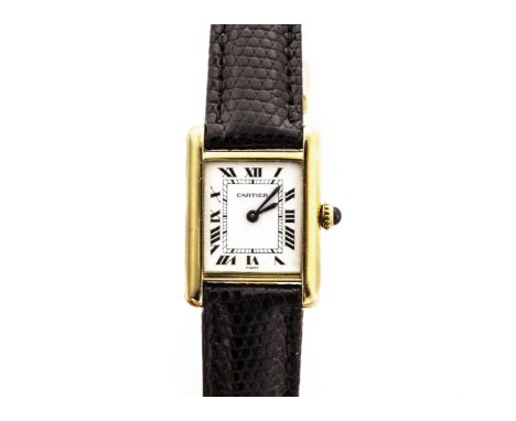 A lady’s 18ct gold Cartier Paris Tank wrist watch, c.1975, with white Roman numeral dial with inner minute track, manual wind