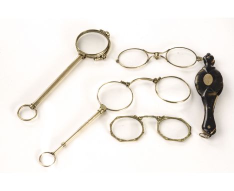 Four pairs of antique lorgnettes, one pair with tortoiseshell outer and gold inset panel, two pairs with long handles and loo