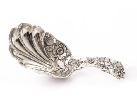 A Regency silver caddy spoon by William Eaton, the shell bowl with floral chasing to the back edge and handle, hallmarks for 