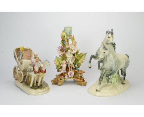 A Lladro group of two nuns, together with two further Lladro figures of nuns, A German porcelain group of two horses, a Meiss