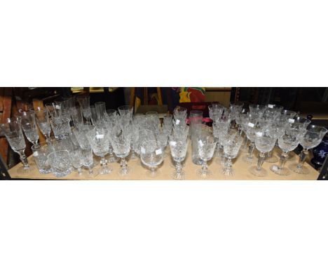 An extensive glassware suite for at least 6-7 people, to include champagne flutes, brandy balloons, red and white wine glasse