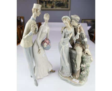 Lladro, two figure groups, of Romeo and Juliet, and a gentleman soldier and his lass, the tallest 44cm high (2)Condition Repo