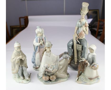 Lladro, a group of four figures to include a large chimney sweep, 43cm high, a figure of an Arab, and two Peruvian girl figur