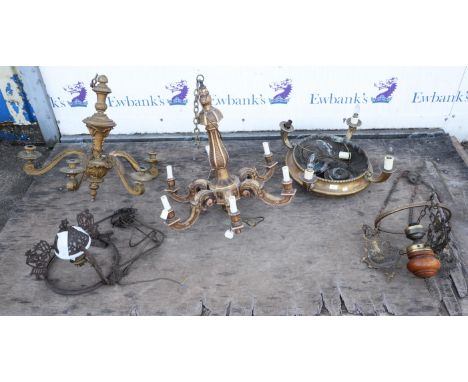 A Baroque style giltwood five arm chandelier, with a facetted stem, wired, W 70cm, together with a similar giltwood example a