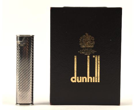 Boxed with papers slimline Dunhill lighter.Condition Report:  Not working, lighter sparks, some dents and scratches