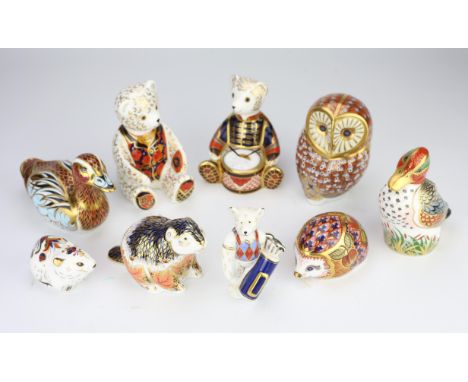 A group of nine Royal Crown Derby paperweights, to include three teddy bears, an owl, a rabbit, a hedgehog, a beaver and two 