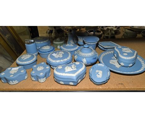 A group of Wedgwood trinket/small boxes, also to include a table cigarette lighter, a bell, a salt and pepper, pin trays and 