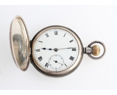 A silver hunter crown wind pocket watch, the white enamel dial having hourly Roman numeral markers with minute track border a