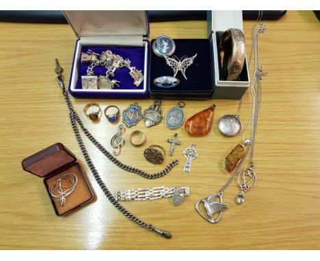 A collection of white metal jewellery, to include an enamel brooch (A/F), pendants and chains, a bangle, a charm bracelet, me
