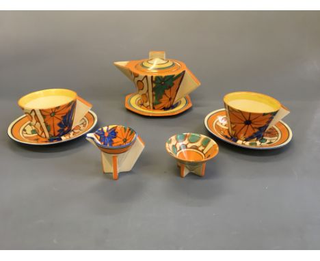 A Clarice Cliff Fantastique umbrella and rain design tea set including teapot, two cups and three saucers, milk jug and sugar