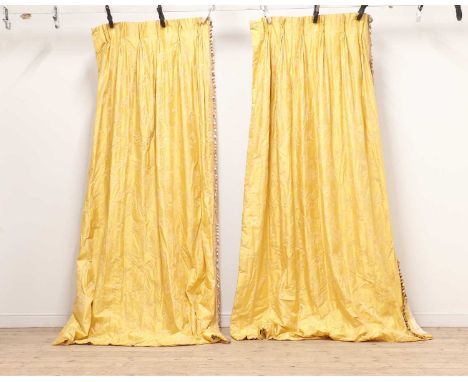 Three pairs of yellow silk damask curtains,of recent manufacture, with triple pleat top and tasselled leading edge, lined, in