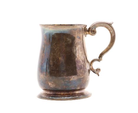 A George II silver mug, by Richard Gurney &amp; Thomas Cook, London 1740, of plain form, with a scrolled handle and raised on