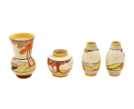 A set of four Clarice Cliff miniature vases,decorated in the 'Coral Firs' pattern, to include a pair of ovoid vases, one flar