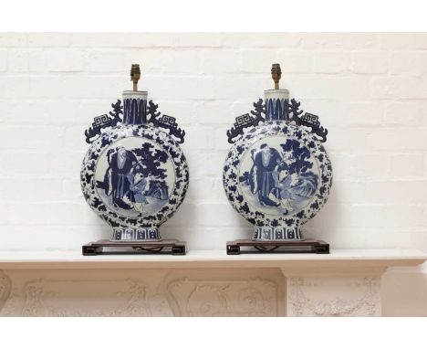 A pair of Chinese blue and white moon flask table lamps, 20th century, on fixed hardwood stands, 57cm high (2)Condition Repor