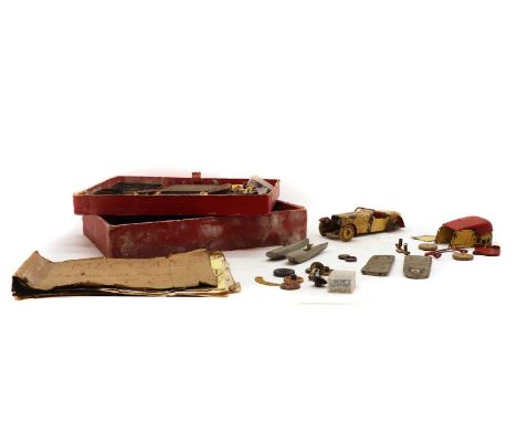 A collection of Meccano,to include a touring car construction kit, wing pieces for an aircraft construction kit, a large quan