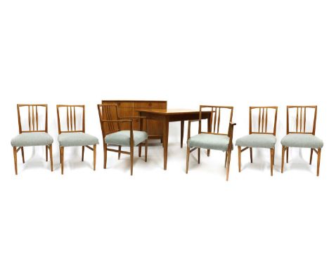 A Gordon Russell walnut and teak dining room suite,  1950s, comprising: a dining table,  with an extra leaf,  153cm wide exte