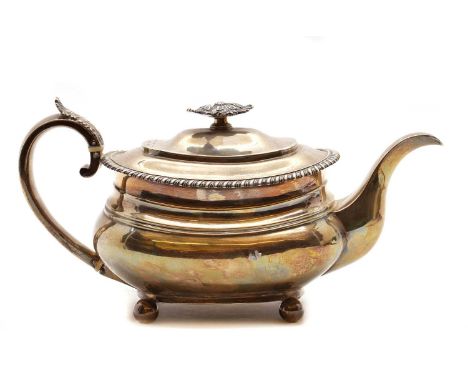 A George III silver teapot,by Joseph Angell I, London 1808, with a gadrooned edge and ivory insulators, 16.5cm high22.8oztIMP