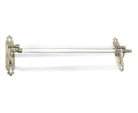 An early twentieth-century wall mounted towel rail, the nickel plated wall brackets united by two glass rails,67cm longCondit