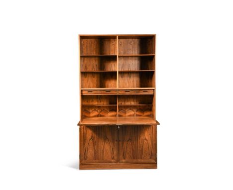 Gunni Omann for Omann Jun, a Danish rosewood secretaire bookcase, the book case top with fall front above a cupboard base191 