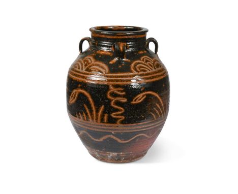 § Michael Cardew (British, 1901-1983) for Winchcombe Pottery, a monumental stoneware vase, the ovoid body potted with four lu