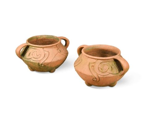 Carter &amp; Co for Liberty, a pair of terracotta jardinieres, designed by Archibald Knox, cast in relief with Celtic knot de