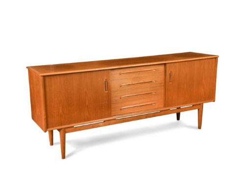 Nils Jonsson for Hugo Troeds, a mid-century teak sideboard, the four central drawers flanked by sliding cupboard doors to eit