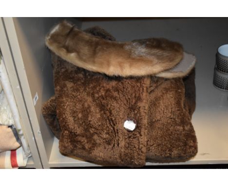 A vintage sheepskin coat and a mink tippet.