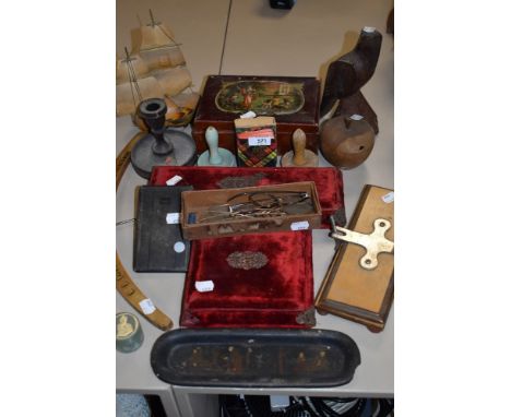 A mixed selection of vintage items including velvet clad boxes, tie press, spectacles and more.