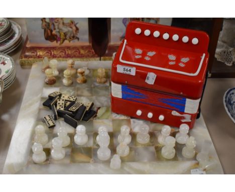 An onyx chess set,AF, vintage dominos and a toy accordion.