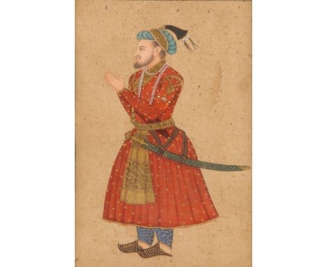 AN INDIAN MINIATURE PAINTING of a nobleman in red tunic with sword, 16.5 x 10cm, framed; and another manuscript leaf with ill