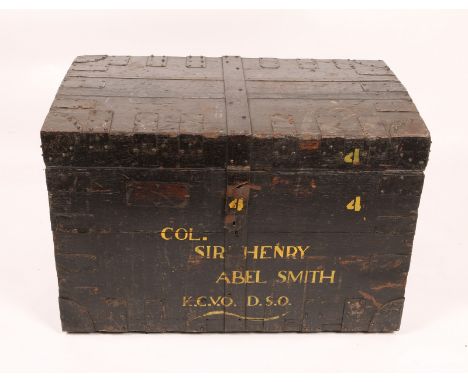 A VICTORIAN OAK AND METAL BOUND SILVER TRUNK labelled for Col. Sir Henry Abel Smith KCVO. DSO. and with a brass R & S Garrard