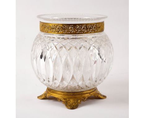 A cut glass vase with pierced gilt metal mounts on anthemion feet, 22cm high CONDITION REPORT: In good condition, no chips or