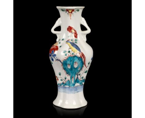 A Worcester two-handled vase, circa 1753-54, of baluster form and quatrefoil section, vibrantly painted with a red crested ho