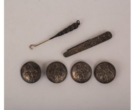 Four Continental circular silver buttons, Berthold Muller, import marks for Chester 1906, depicting a couple walking out, a s