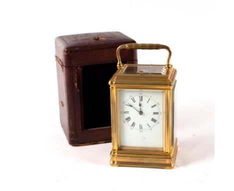 A French gilt brass carriage clock with repeat mechanism, the enamel dial indistinctly signed, the movement marked Paris, 16c