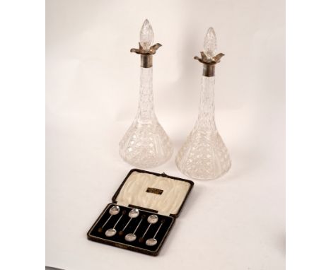 A pair of Edwardian silver mounted glass decanters and stoppers, the mounts William Hutton &amp; Sons Ltd., Sheffield 1909, 3