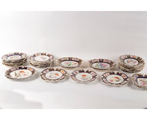 An English porcelain blue ground part dessert service, circa 1850, each piece painted with flowers in panelled borders and sc